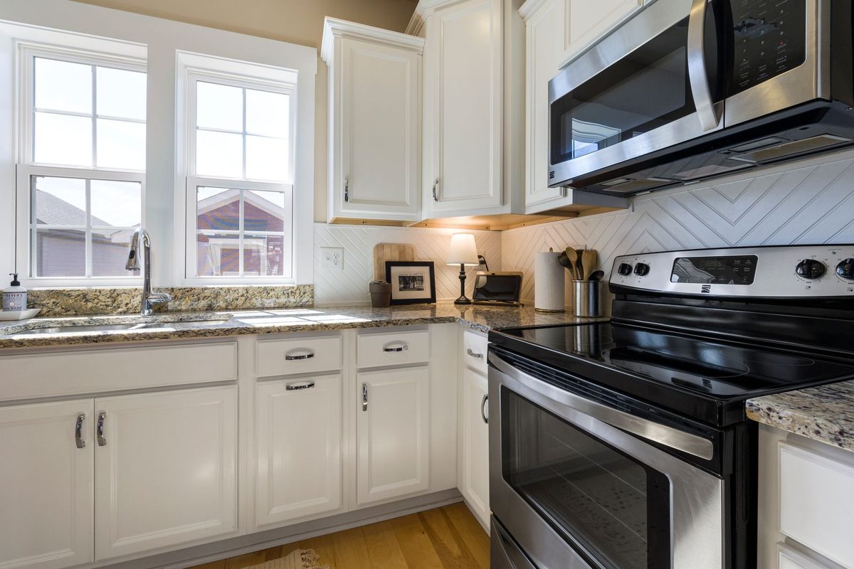 Elegant painted kitchen cabinetry in a luxury home
